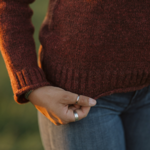 Ladies Mae Wool Sweater Wild Plum sleeve detail with turquoise ring