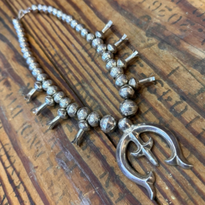 Vintage sterling silver squash blossom necklace with sandcast naja pendant